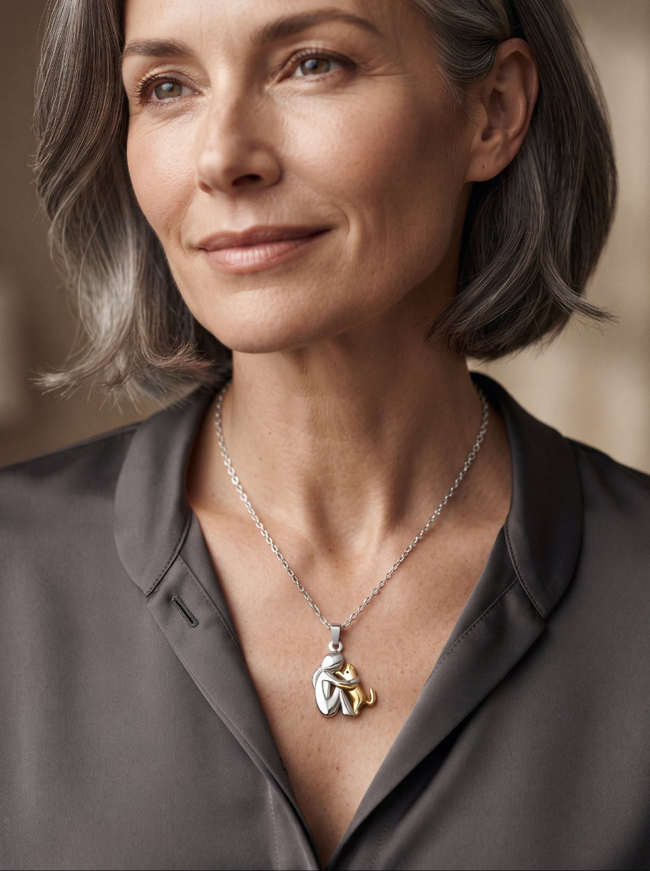 Woman wearing the Lindalia Eternal Hug Pet Necklace, cat edition